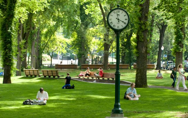 Students in park blocks with clock