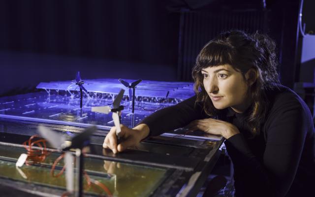 woman working on wind tunnel experiment